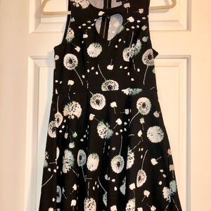 Knee length dandelion dress with heart eyelet